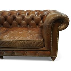 Timothy Oulton for Halo – tan leather three-seater Chesterfield sofa, fully deep-buttoned to the arms, back and seat, with studded front rail, rolled armrests and turned bun supports