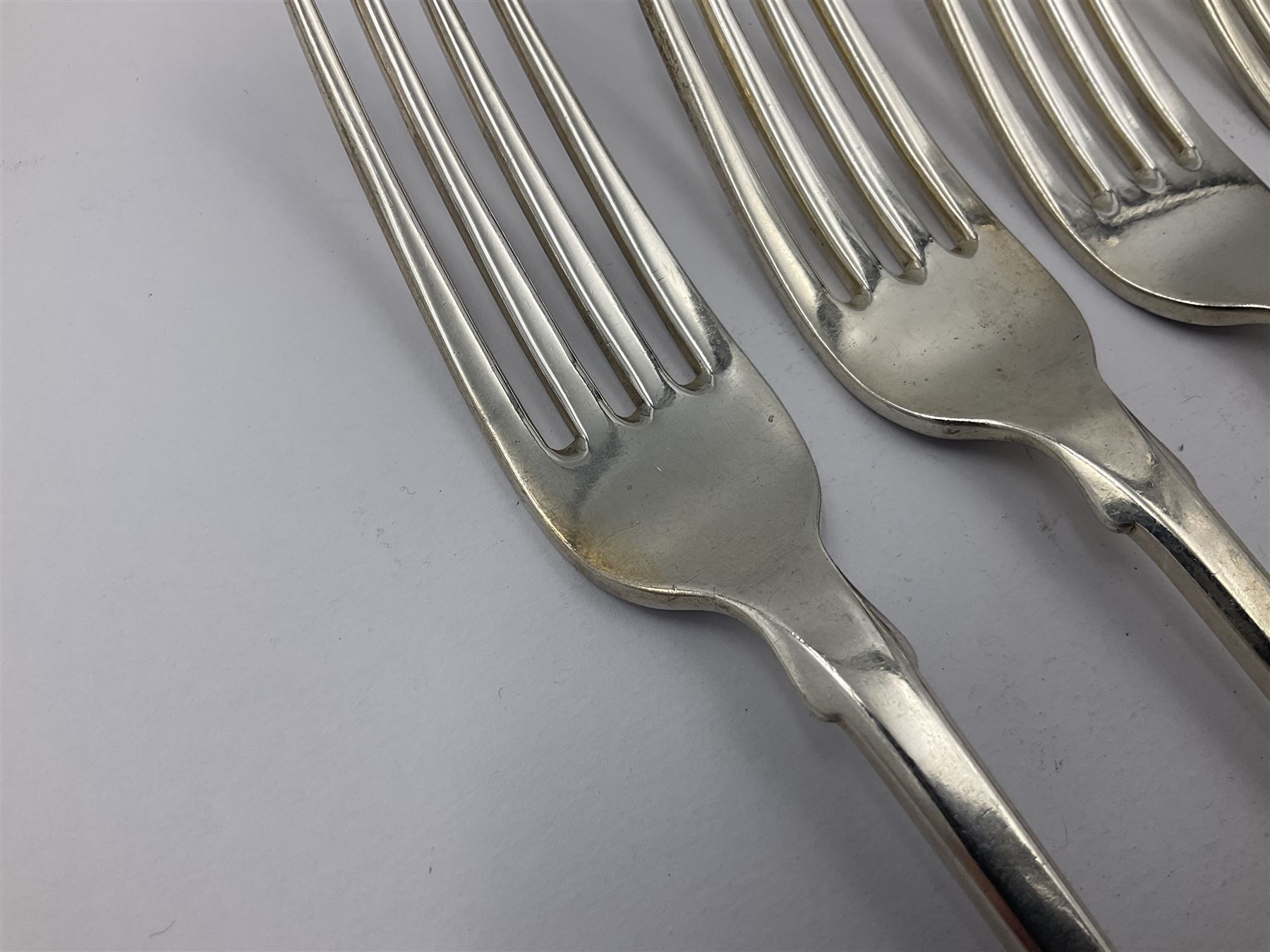 George IV Scottish silver Kings pattern cutlery for six place settings, to include table spoons, table forks, dessert spoons and dessert forks, all engraved with shamrock crest to terminal, hallmarked Robert Gray & Son, Glasgow 1833