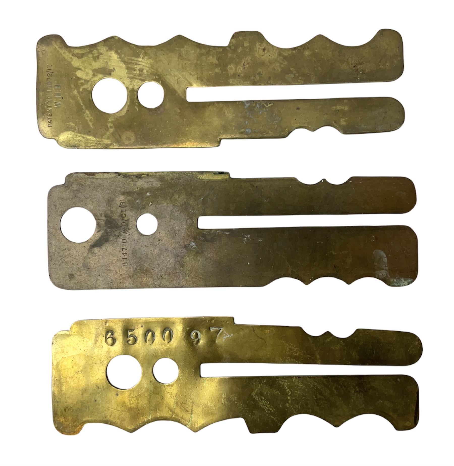 Three war department brass uniform protector button polisher, one marked 650097