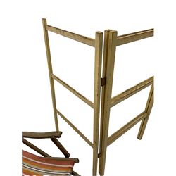 Mid-20th century deck chair with slung striped cover, and a early 20th century clothes horse 