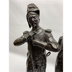 After Etienne-Henri Dumaige (1830-1888): 'Avant de Combat Volontaire de 1792' and 'Apres de Combat Grenaider de 1792', pair of large bronze figures modelled as French Revolutionary soldiers, each upon rectangular stepped black marble base, signed E H Dumaige, Paris 1888, tallest example H68.5cm
