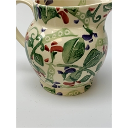 Four Emma Bridgewater mugs, together with a jug, and preserve pot and cover, decorated in sweet pea pattern, mugs H7cm. (5). 