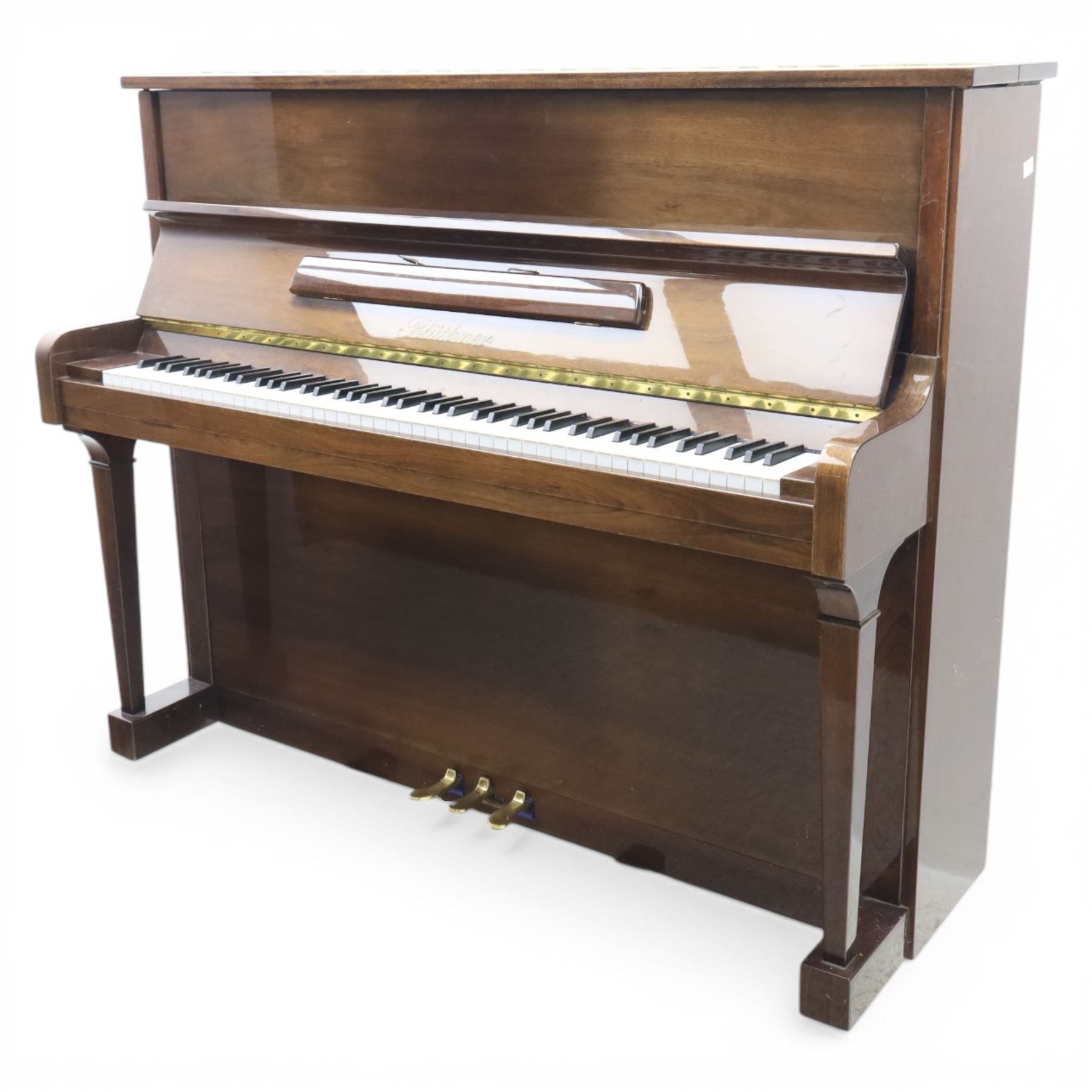 Bluthner of Leipzig upright piano, mahogany case with 88 keys and three brass pedals