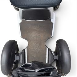 TGA Scoozy - mobility scooter, four wheel model with joystick controls, front storage bag, lights and grey and black bodywork.
