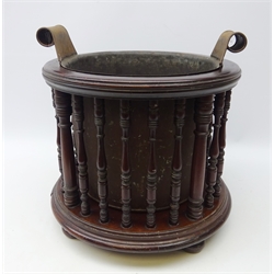  19th century mahogany peat bucket, circular frame, turned supports and brass liner with scroll handles on four bun feet, H39.5cm x D37cm  