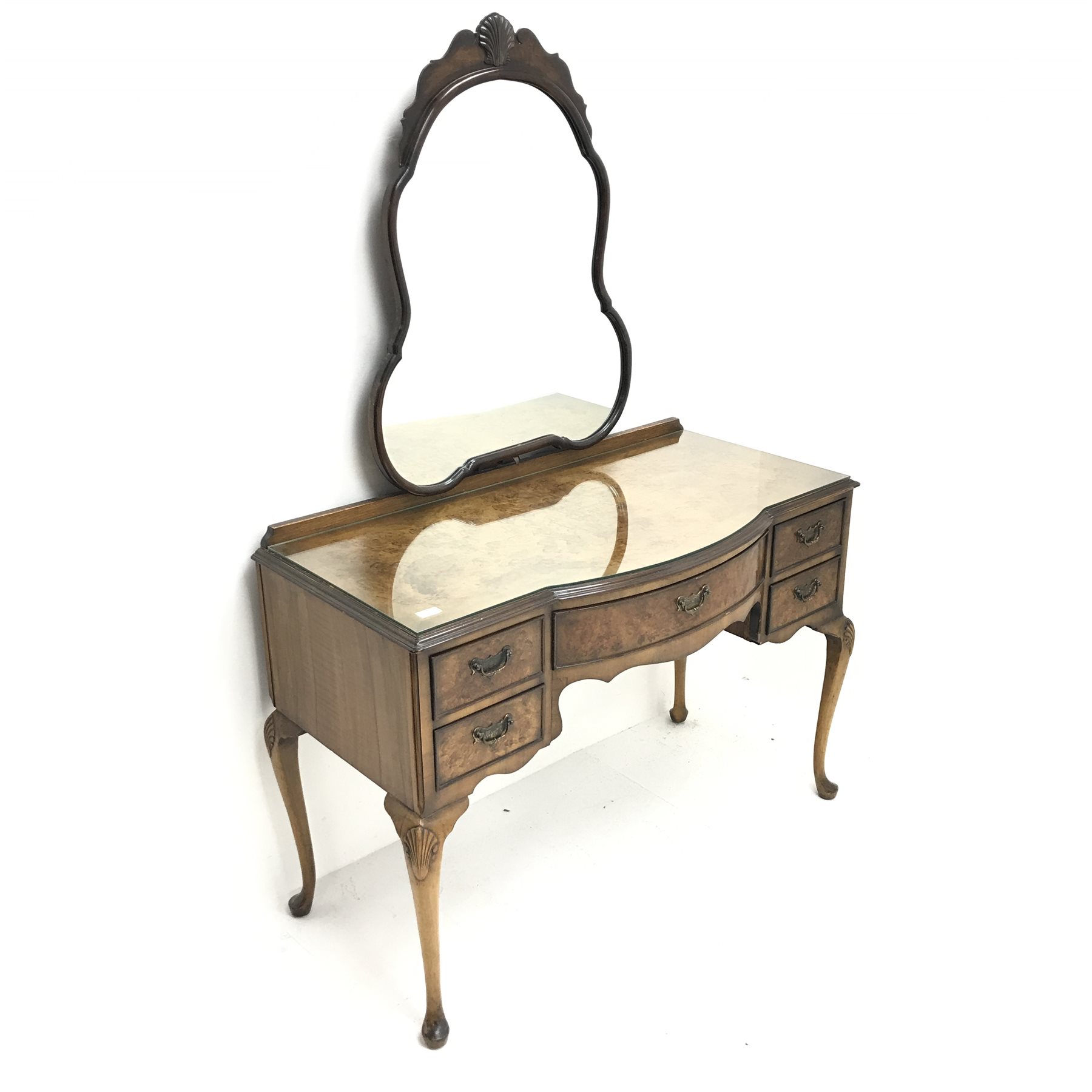 Queen Anne style walnut bedroom suite consisting of double arched top wardrobe, two doors, plinth base on shell carved cabriole feet (W123cm, H200cm, D55cm) a matching knee hole dressing table, raised mirror back, five drawers, shell carved cabriole legs (W114cm, H165cm, D60cm) a double 4'6