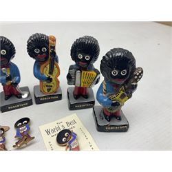Eight Robinson Jam plaster Golly band figures, all with paper labels, together with pin badges