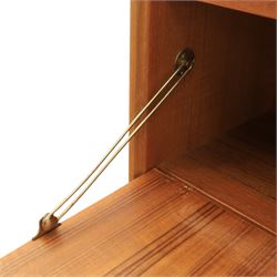 G Plan - Mid 20th century teak units, comprising tall shelving unit with cupboard sections, fall front and open shelves, together with a low twin-door cupboard unit, on plinth bases

Low unit: H 53cm, D 46cm, W 81cm
Tall unit: H 199cm, D 46cm, W 76cm