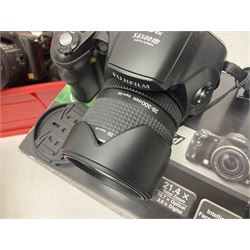 Minolta Dynax 5xi camera body serial no 17222646 with 'AF Zoom Xi 28-80mm 1:4(22)-56' lens serial no 17220881, Minolta SRT101 camera body serial 1944687, Lumix camera body serial no K6SC10168 etc 