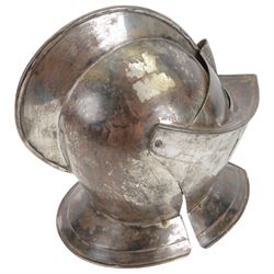 Reproduction 17th century European close helmet, the visor with elongated sights, two-piece skull with a high medial roped comb