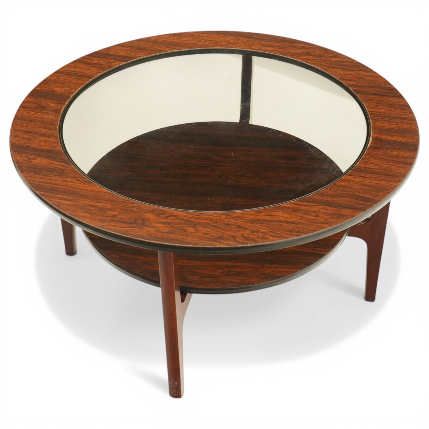 Mid 20th century Greaves & Thomas simulated rosewood circular coffee table, inset glass top with circular undertier on four tapering legs