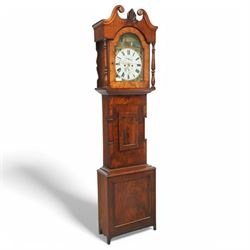 James Hall of Newcastle-Late19th century mahogany longcase clock c1870, with a swan necked pediment and break arch hood door beneath flanked by ring turned pilasters, trunk with half-round inset pilasters and a short panelled trunk door, on a square plinth with a recessed panel, painted dial with spandrels depicting country cottages and a coastal scene of a child and fisherman to the arch, with Roman numerals, minute track, date and seconds dial and stamped brass hands, dial attached via a false plate to a rack striking movement striking the hours on a bell. With weights and pendulum. 
James Hall is recorded as working  from King Street Newcastle-upon-Tyne from 1850 onwards. 
This clock was the subject of a detailed article on both the clock and maker, published in CLOCKS magazine in 2009. 
