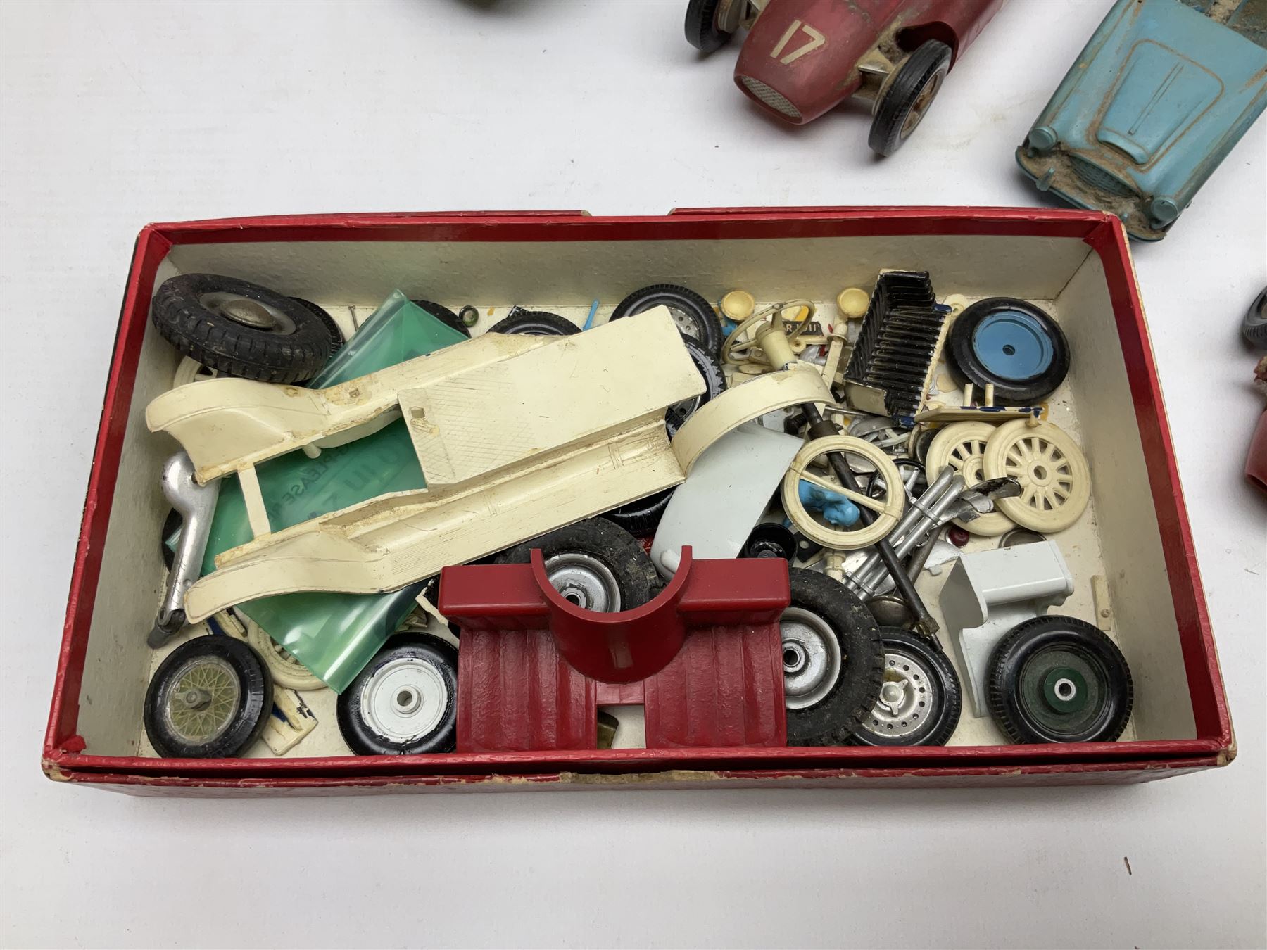 Various Makers - fourteen unboxed and playworn die-cast models including Wee-Kin Sunbeam Talbot, Corgi James Bond Aston Martin and ERF lorry, Dinky Thunderbolt Racing Car, Cadillac Eldorado, Cunningham C5-R, Lagonda etc; Minic tin-plate police car and jeep; other tin-plate models; Merit Plastic racing cars and quantity of spare parts etc