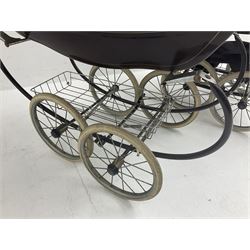 Pair of 1980s Silver Cross brown coach built dolls prams; each with folding canopy and apron, tubular framework with suspension, spoked wheels with brake and luggage rack and separate matching shopping bag L93cm