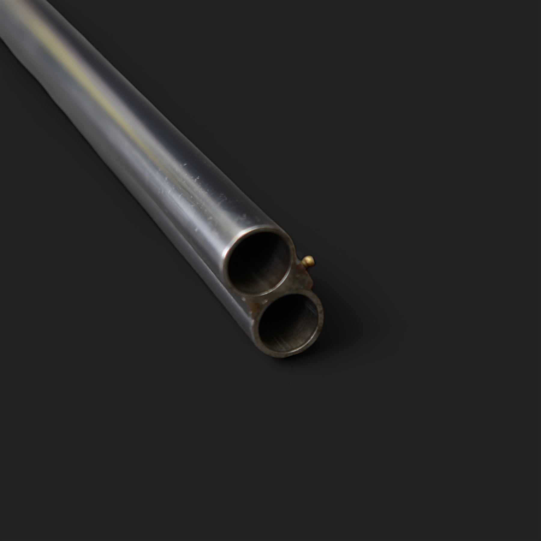 Carr Brothers of Huddersfield 12 bore side by side shotgun with engraved sidelock plates, trigger guard, underside, top plate, thumb lever and fences, chequered semi-pistol grip and horn tipped forend, vacant cartouche to the underside of the stock, double trigger and named 28 inch sleeved barrels choked ¾ and ½, overall length 113cm SHOTGUN CERTIFICATE REQUIRED