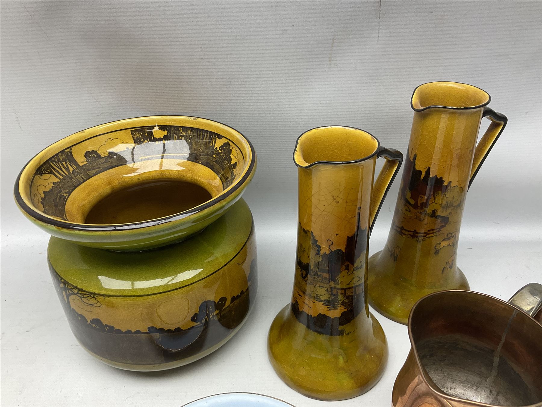 Royal Doulton wide rimmed jardinière, together with two Royal Doulton jugs, Arthur Wood jugs etc