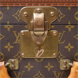 Mid-20th century Louis Vuitton monogram cabin trunk,  monogram canvas with lozine trim and brass mounts, single front leather handle with lock stamped Louis Vuitton with key code 1080701, the interior fitted with original webbing straps and lift-out tray, label to lid printed 'Avenue Marceau 78bis - Paris Nice - 2 Avenue de Suède' serial number 953998, circa1960s, with original key present
