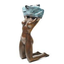 Bronze figure, modelled as a nude woman removing her shirt, signed Milo, H17cm