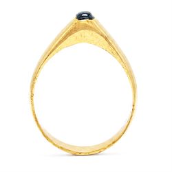 Medieval gold sapphire stirrup ring, circa. 1150-1500, the hoop of ‘D’ shaped cross-section, with raised triangular shaped bezel centred at the apex with a cabochon sapphire