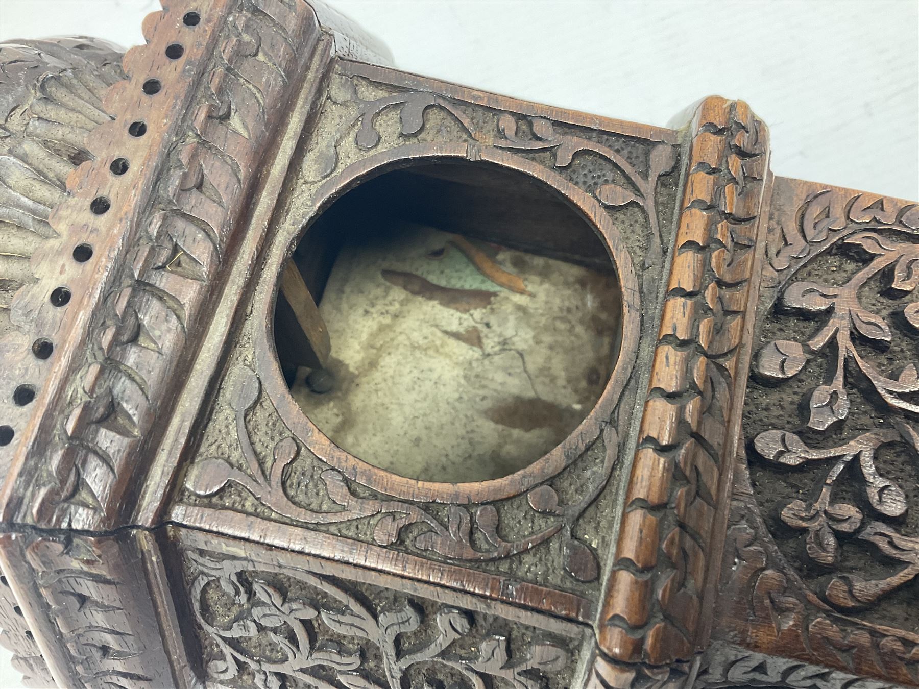 Carved wooden pocket watch holder/stand, in the form of a clock tower, with carved floral design and domed top, H36cm