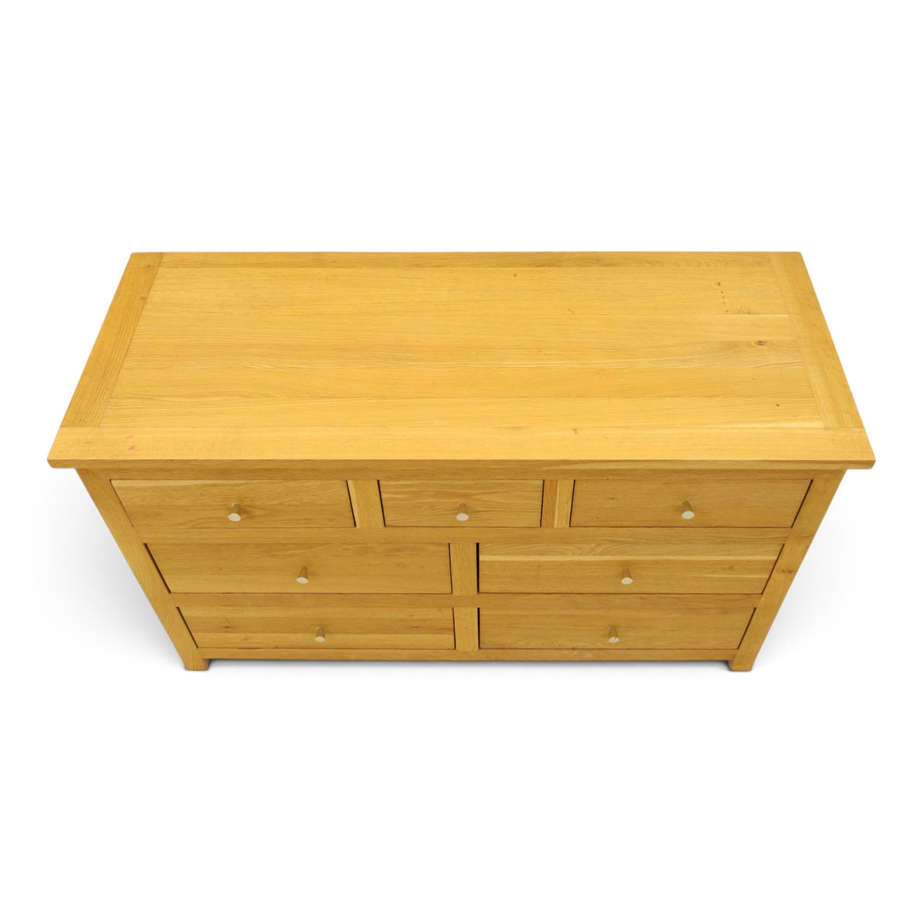 Contemporary light oak chest, rectangular top fitted with three short over four long drawers, on square feet