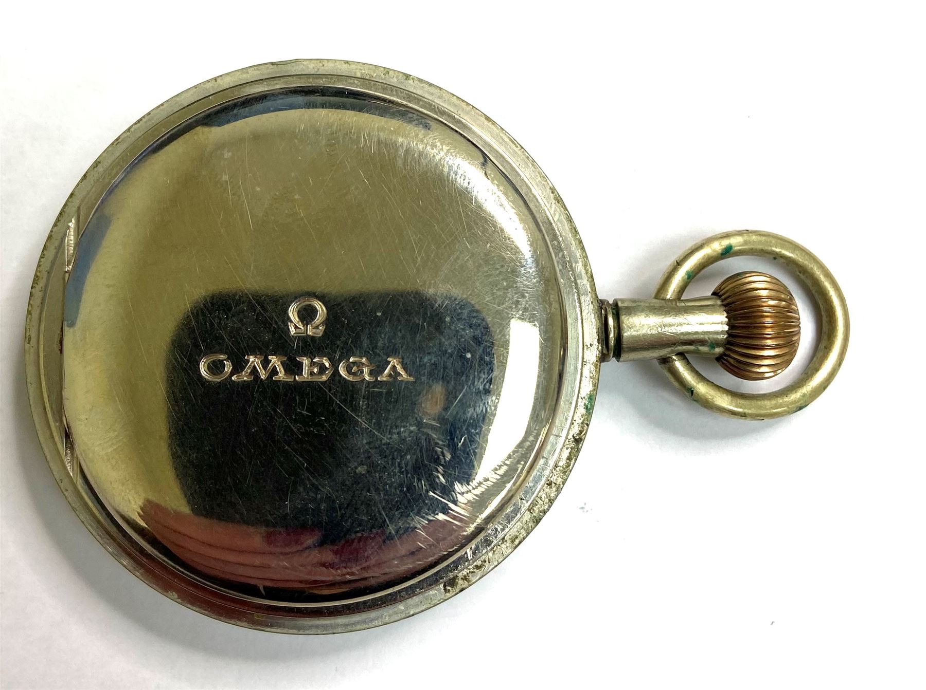 Royal Flying Corps Mark V military pocket watch by Omega, No. 5239490, black dial with Arabic numerals and subsidereary seconds dial, marked 30 hour non-luminous, B.B.7468, the case back with Broad Arrow beneath underlined A