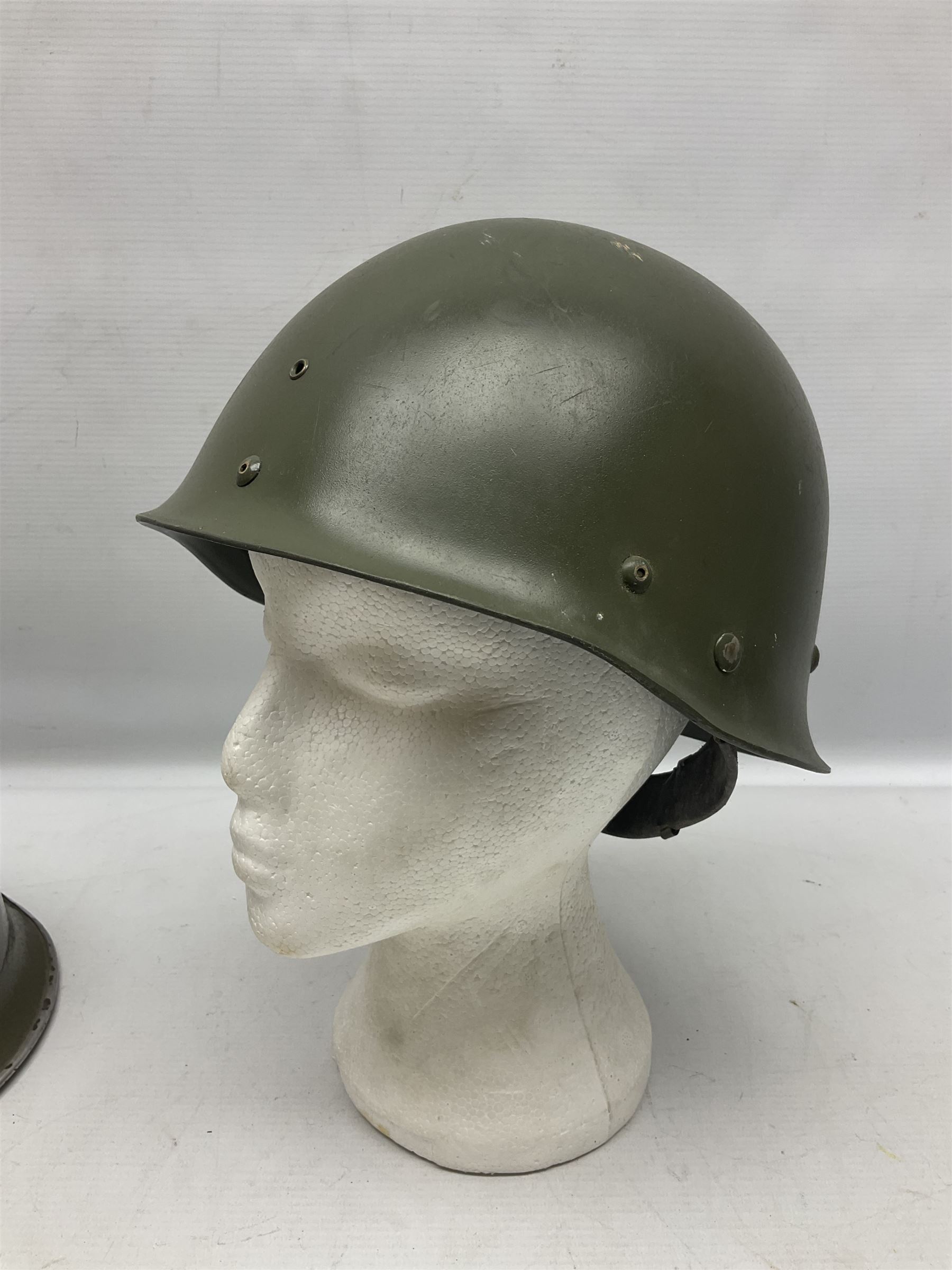 1950s French Algerian War steel helmet with liner; indistinctly marked 'S.I.A. LE EANS(?) 71R'