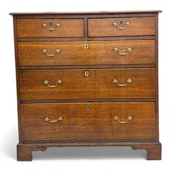 George III oak chest of drawers, the top with a moulded edge above an arrangement of two s...
