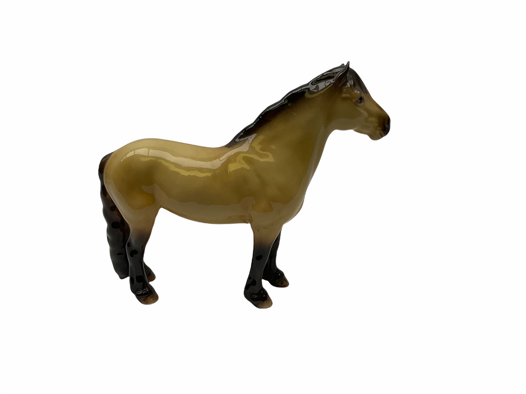 Beswick horse figures, comprising Highland Pony 1644, and another, probably Aran Bahram in grey, each with printed mark beneath.
