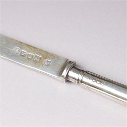 Tiffany silver teething ring marked 'Tiffany sterling 925', boxed, Junghans bedside clock in silver mounted frame, pair of silver sauce ladles and a silver knife