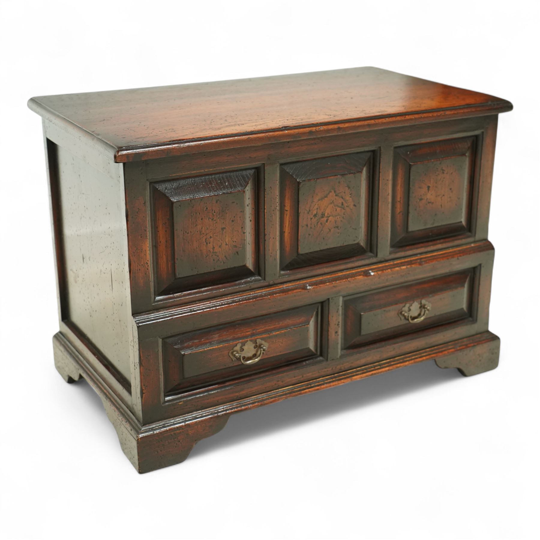 Titchmarsh and Goodwin design miniature oak coffer, rectangular, removable top with projecting panelled front with blind drawers on bracket feet 
