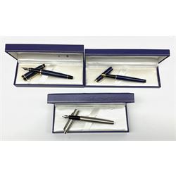 Three Waterman fountain pens, comprising Waterman Expert in navy blue, Waterman Hemisphere in blue, and Waterman Hemisphere in brushed steel, each in maker's fitted blue leather box. 