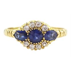 Early 20th century 18ct gold three stone oval cut sapphire and eight stone diamond cluster...