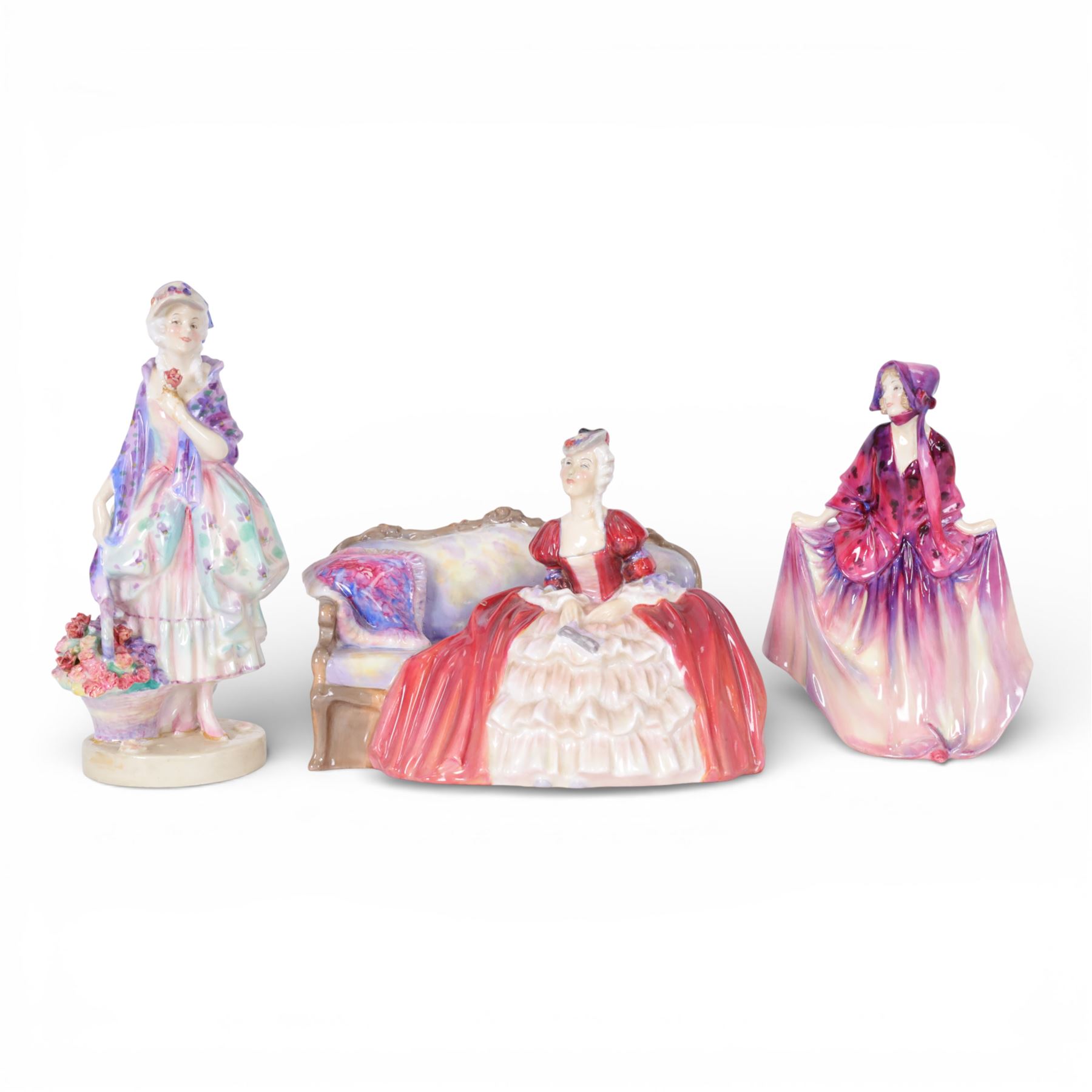 Three Royal Doulton figures, comprising Belle O'The Ball HN1997, Sweet Anne HN1496 and Phyllis HN1420