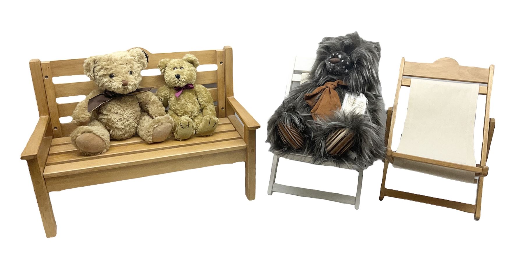 Charlie Bears bench, H41.5cm L58.5cm D29.5cm, and two Charlie Bears deck chairs, each approximately H37cm, together with a limited edition Silver Tag Bear, Logan Bear, 226/1,500, with tag, and two further bears, (6)
