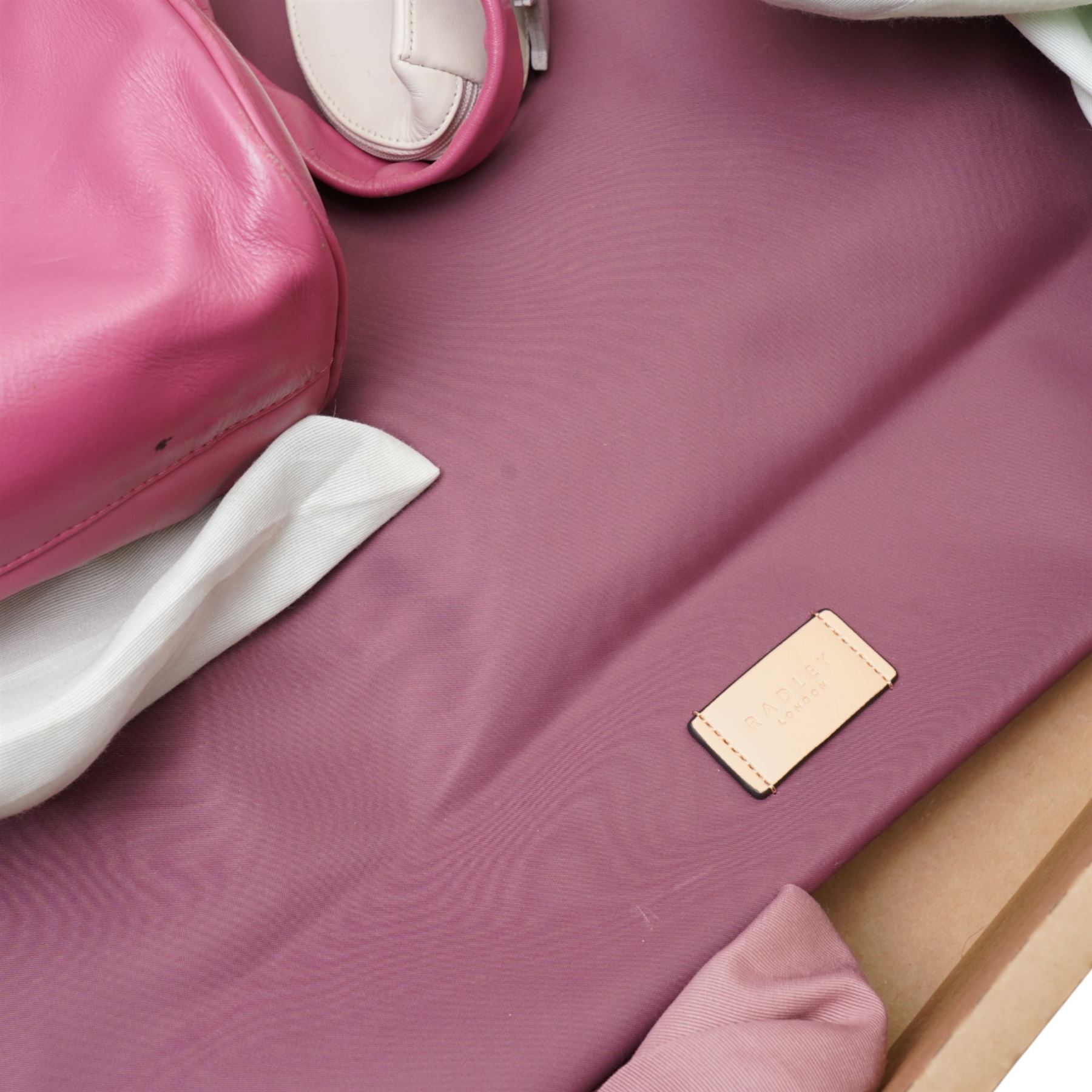 Collection of Radley pink and purple leather and fabric handbags and purses, most with original dust bags