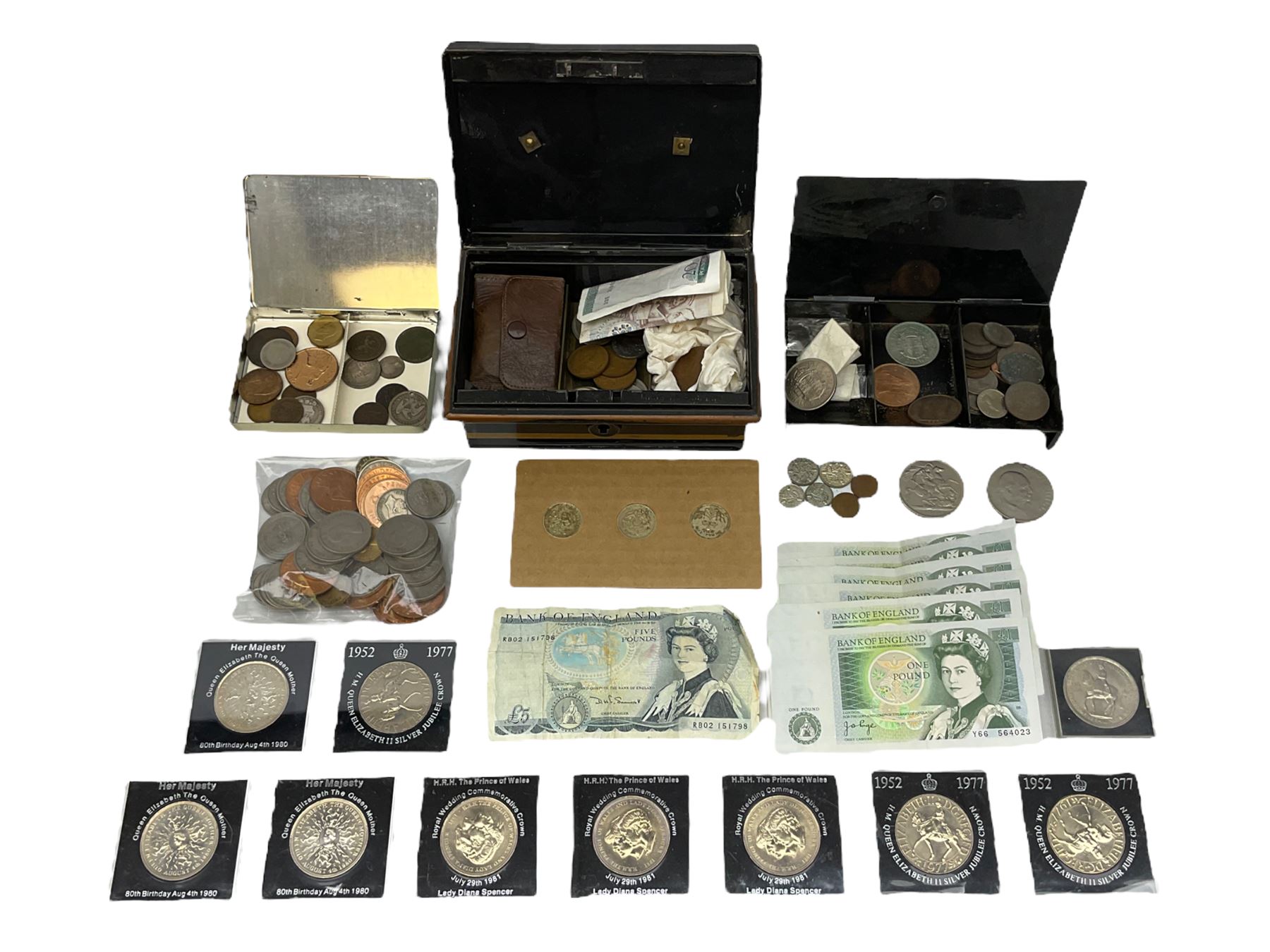 Great British coins and banknotes, including George IV 1826 shilling, Queen Victoria 1887 shilling, 1899 sixpence, Queen Elizabeth II 1967 pennies and other pre-decimal coinage, commemorative crowns, Bank of England one pound notes etc, housed in a small cash tin and loose
