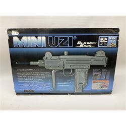 MiniUzi Blow Back CO2 .177 Semi Auto air gun with folding shoulder stock No.10821714 L35cm; boxed with magazine