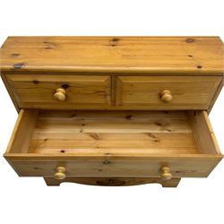 Pine chest of drawers topped with carved pediment with acorn and oak leaf motif, fitted with two short over three long drawers, standing on shaped apron base (W92, D46, H97cm); pine bedside cabinet, single drawer above paneled cupboard door enclosing open storage, shaped plinth base (W43, L32, H67cm)