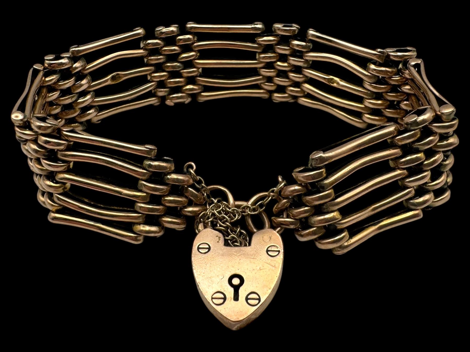 9ct gold five bar gate bracelet with heart padlock clasp, stamped 9c
