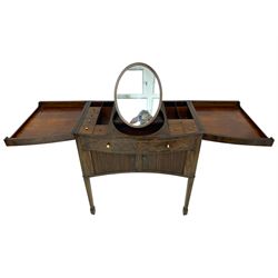 Regency mahogany bow-front dressing table or stand, the top with gadrooned edge hinges to reveal small divided and lidded compartments and oval hinged mirror, fitted with false drawer over concaved tambour roll cupboard, with applied geometric moulded decoration, on square tapering supports with spade feet, with small wooden and ivory turned handles
This item has been registered for sale under Section 10 of the APHA Ivory Act