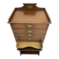 Edwardian walnut sheet music cabinet, raised back with plaque inscribed 