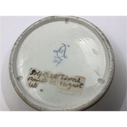 Sèvres soft paste porcelain coffee can and saucer with date code for 1780, painted with pink oval panels bordering bouquets of flowers, united by swags of flowers tied with purple ribbons, within laurel leaf borders, interlaced LL monogram enclosing date letters CC above painters marks for Nicquet, coffee can H7.5cm, saucer D15cm