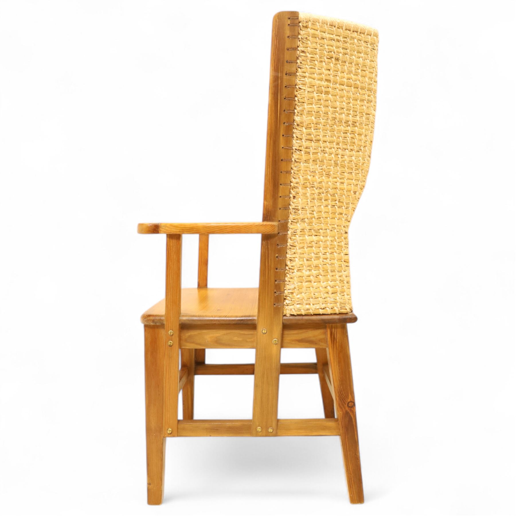 Pair of 20th century full-size pine Orkney chairs, high-back armchairs of traditional design, pegged and wedged construction, wrap-around backrest and sides, above scrolled out-swept arms and solid rounded pine seat, raised on square tapering legs united by stretchers, hand-signed ‘Jackie Miller’ and stamped ‘Orkney’
