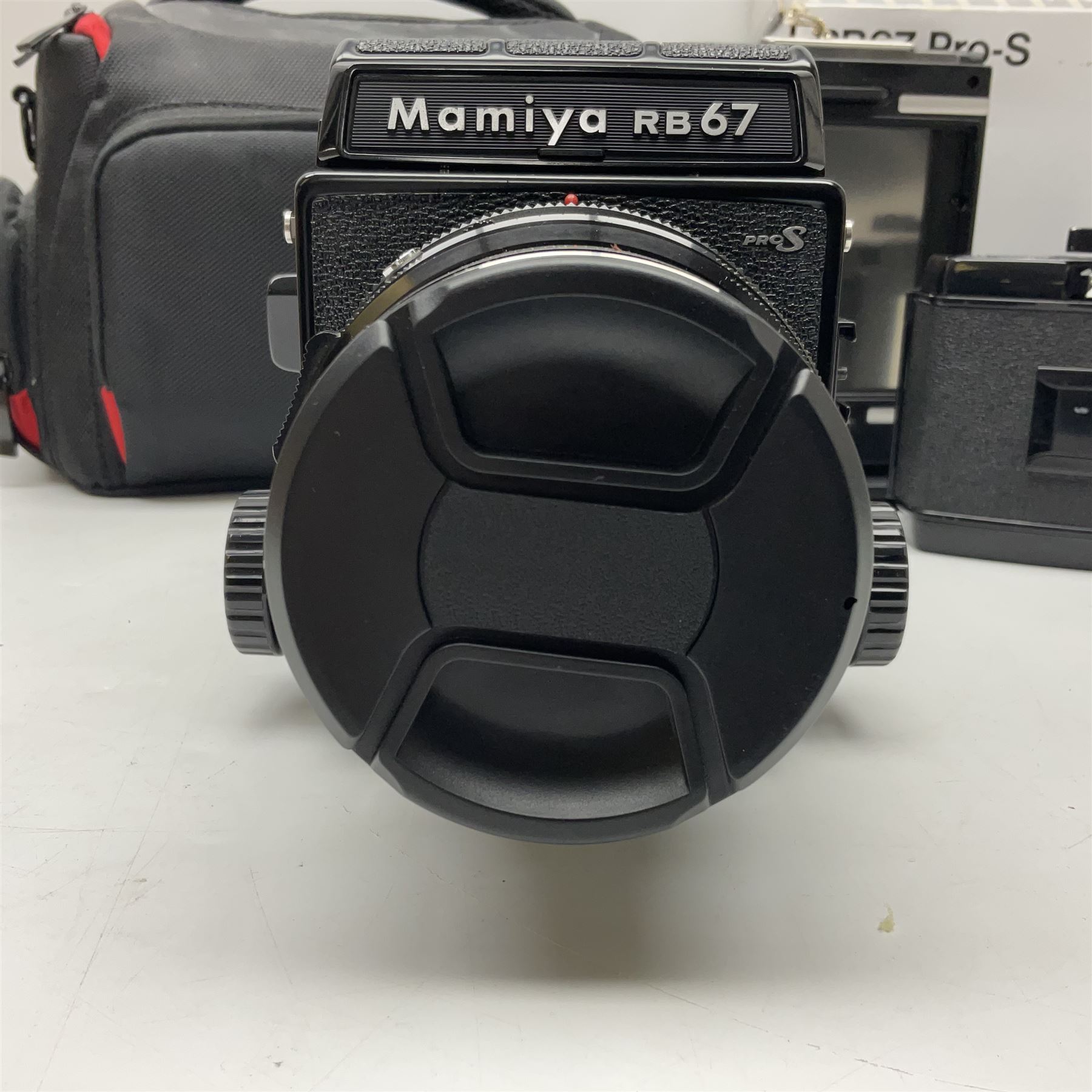 Mamiya RB67 Pro-S camera body, serial no. C559634, with 'Mamiya - Sekor C 1:3.8 f=90mm' lens, serial no. 75999, Mamiya RB 6x8 Pro-S 120 Roll Film Holder and Mamiya Polaroid back holder, with carry case and original boxes 