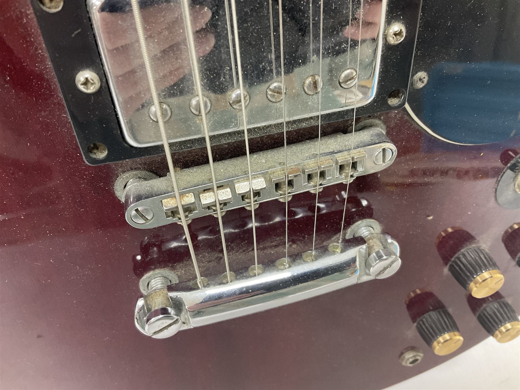 Gibson Epiphone SG six string electric guitar, with cherry red mahogany finish and black scratch guard, L102cm