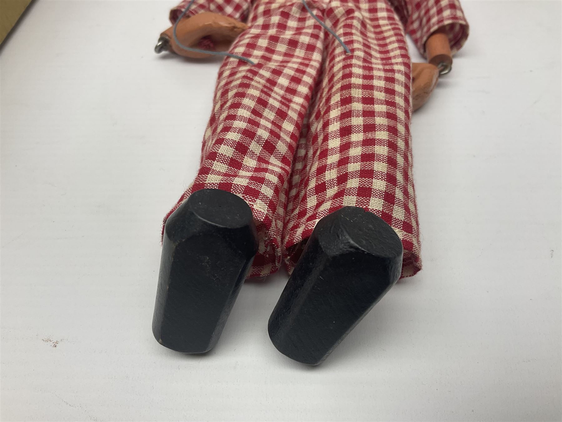 Pelham Puppet - a rare type SM Harlequin circa 1950s with painted black face mask, black felt hat, green ruff and red white chequered suit, H31cm; in original box with instructions 