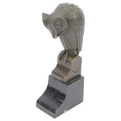 Bronze figure of a stylised eagle owl upon a marble base, H25cm 