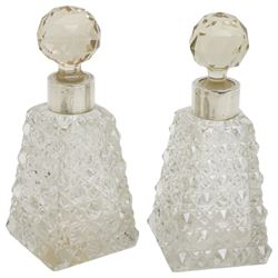 Edwardian silver backed hand mirror decorated with angels heads Chester 1903 and pair of Victorian glass and silver mounted scent flasks Chester 1894