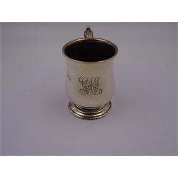 1930s silver mug, of waisted form with engraved monogram to body, with acanthus capped scroll handle, upon a stepped circular foot, hallmarked William Neale & Son Ltd, Birmingham 1931, H9.5cm